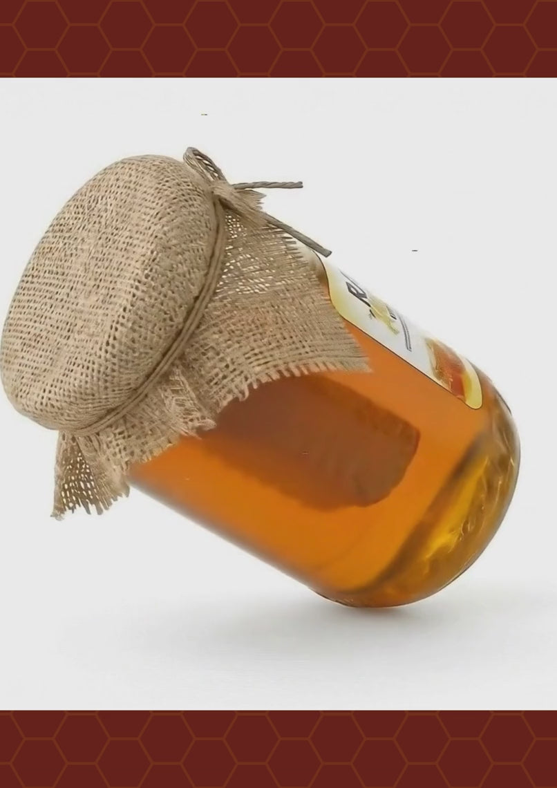 Product video showcasing raw honey with comb 450 g by Guntur Khadi highlighting natural texture and purity